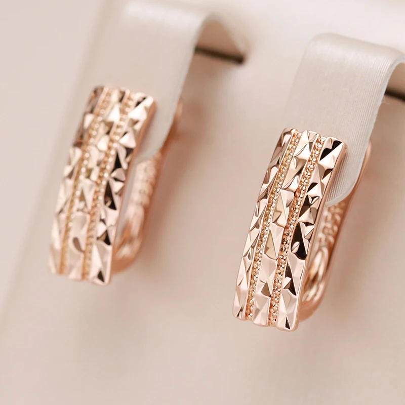 Ohrringe Creole Huggie 585 RG Rotgold Rosegold mit Zirkonia.