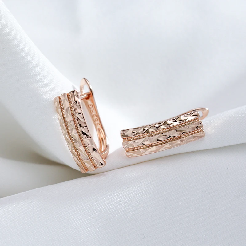 Ohrringe Creole Huggie 585 RG Rotgold Rosegold mit Zirkonia.